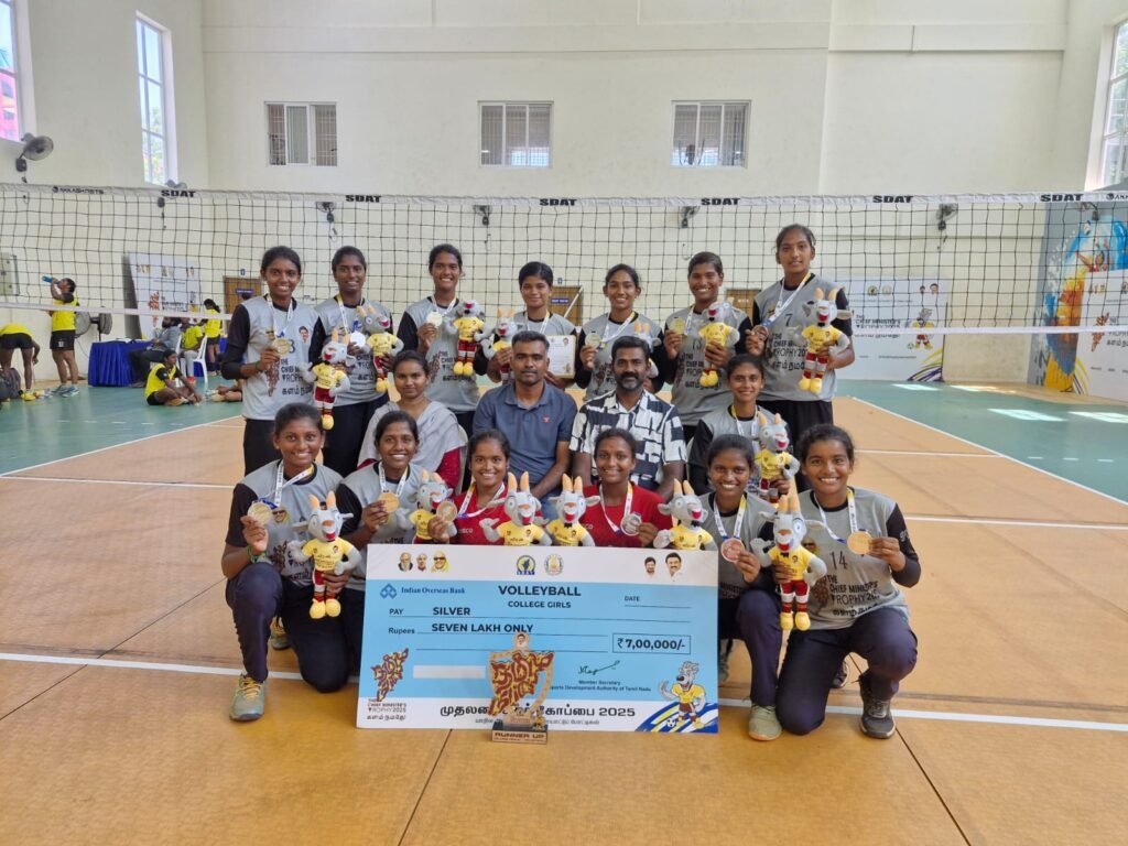 “PKR Arts College for Women Volleyball Team celebrating their silver medal win at the Chief Minister’s Trophy 2025–2026 with coaches and awards